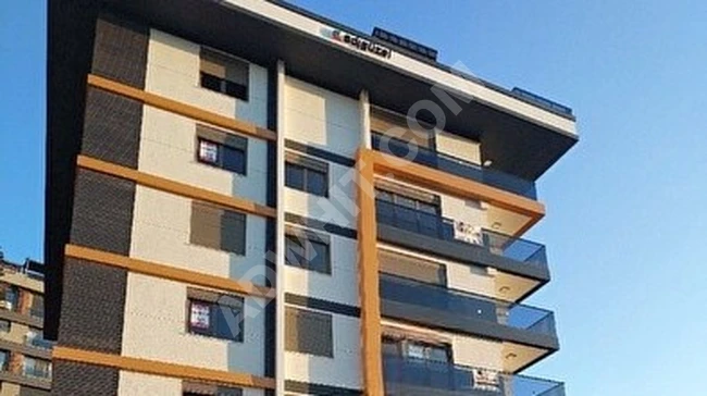 4+1 apartment in a new building with a covered parking lot and sea view in İCADİYE from YEŞİL EMLAK.