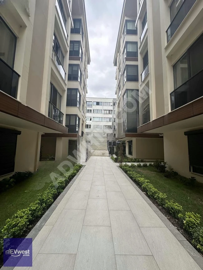 Empty apartment for sale on the middle floor within the Motif Garden complex - from EVwest