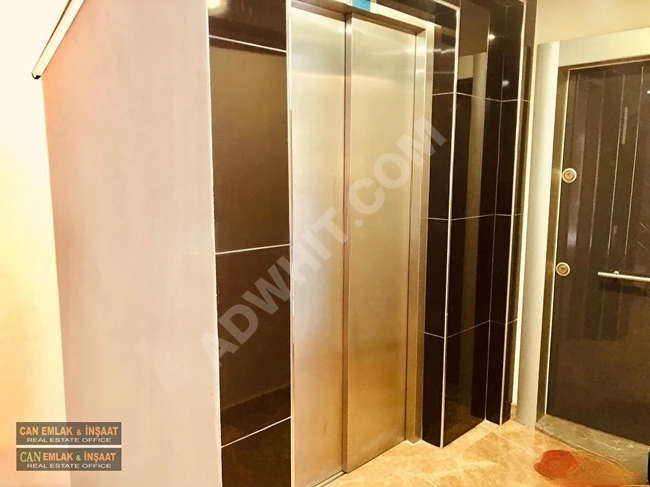 Brand new apartment in Cihangir, 5 minutes from Taksim, in a modern building with a balcony, elevator, two air conditioners, and central heating.