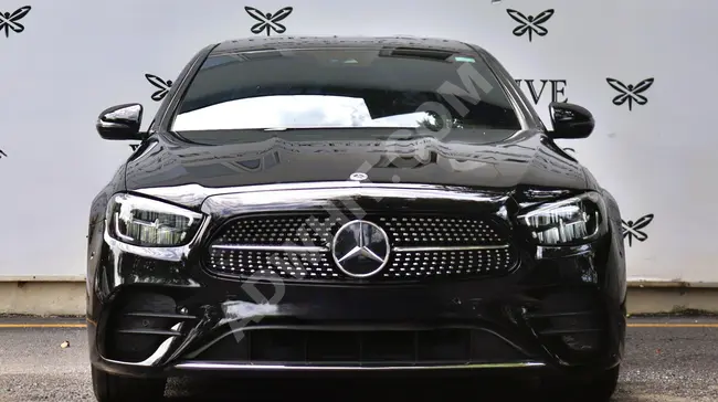 Mercedes - BenzE200D AMG-COMMAND موديل 2023 - نظام صوت BURMESTER- ابواب شفط - بدون طلاء- X-CLUSIVE