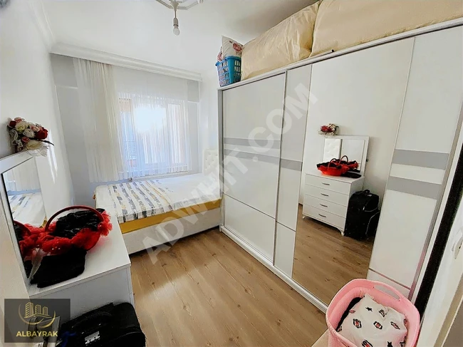 Apartment 2+1 with an area of 100 square meters, on the middle floor, with two balconies, above the street near the metro - from ALBAYRAK