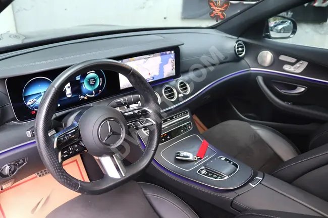 Mercedes - BenzE200D AMG-COMMAND موديل 2023 - نظام صوت BURMESTER- ابواب شفط - بدون طلاء- X-CLUSIVE