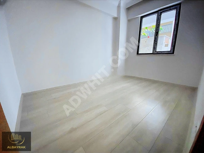 New 2+1 apartment, on the middle floor, spacious with a separate kitchen, on 23 NİSAN CAD. - by ALBAYRAK