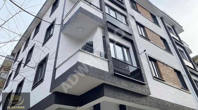 New 2+1 apartment, on the middle floor, spacious with a separate kitchen, on 23 NİSAN CAD. - by ALBAYRAK