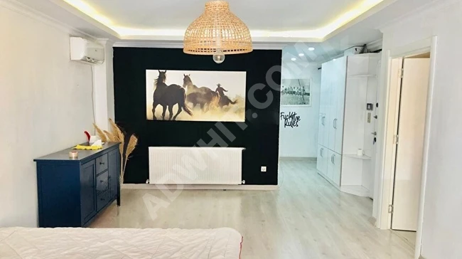 Brand new apartment in Cihangir, 5 minutes from Taksim, in a modern building with a balcony, elevator, two air conditioners, and central heating.