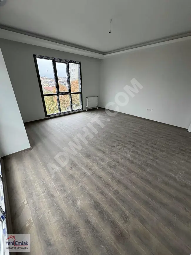 A 3+1 apartment for rent with an area of 120 square meters in a boutique complex with parking on ATATÜRK Street from YENİ.