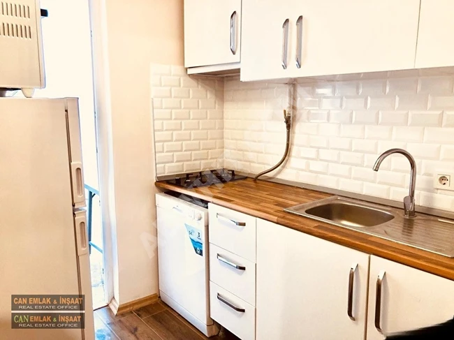 Garden floor apartment in Cihangir with a completely central location, fully renovated as if new, (2) air conditioners, combi heating system.