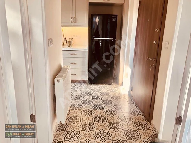 1+1 apartment with an area of 60m2 featuring air conditioning, combined heating, fully newly furnished, high ceiling, completely renovated, located in the center in Cihangir.