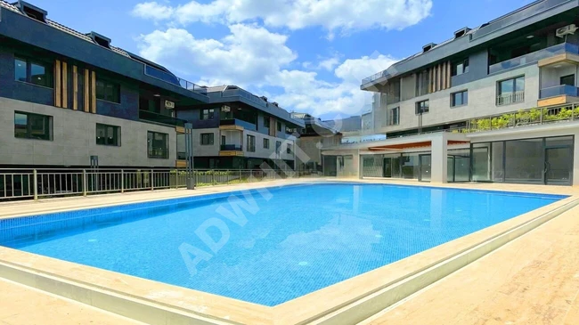 A 4+1 villa with a sea view in a fully serviced complex by SONSUZ YAPI