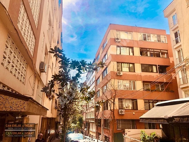 3+1 apartment with an area of 140m², equipped with combi heating, two balconies, an elevator, and a chimney heater in a corner building in Cihangir Coşkun.