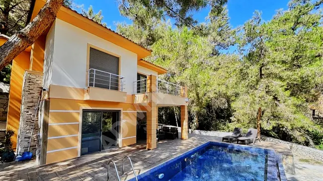 For sale: A furnished, stand-alone villa with a swimming pool overlooking the forest in Soğucak.