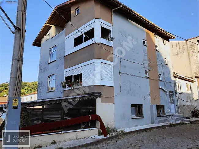 Building for sale at the price of an apartment in the village of Bozkurt İlişi.