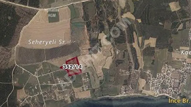 Land for sale with a permit for villa construction with a sea view.