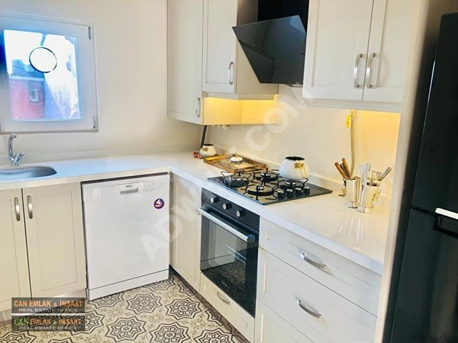 1+1 apartment with an area of 60m2 featuring air conditioning, combined heating, fully newly furnished, high ceiling, completely renovated, located in the center in Cihangir.