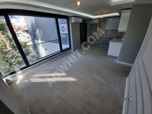 DELUXE 26' DAN YENİ BİNADA TAM MERKEZDE ARA KAT 2+1 75 m2 DAİRE