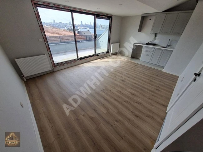 3+2 duplex apartment with an area of 185 m2 in a new building, featuring a terrace annex and a sea view - from DELUXE 26