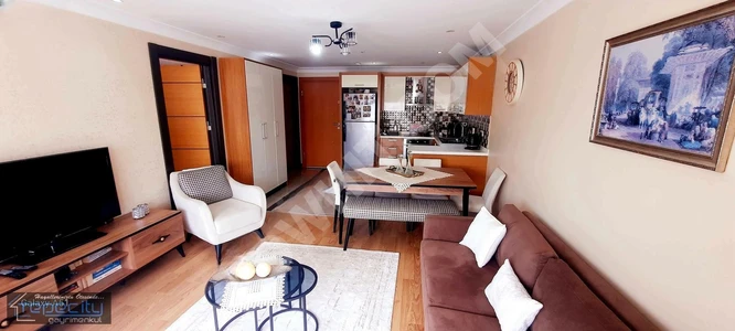 1+1 apartment for sale with an area of 70 square meters, in the BEYAZ RESIDENCE complex, located in the BAHÇELİEVLER YENİBOSNA area.