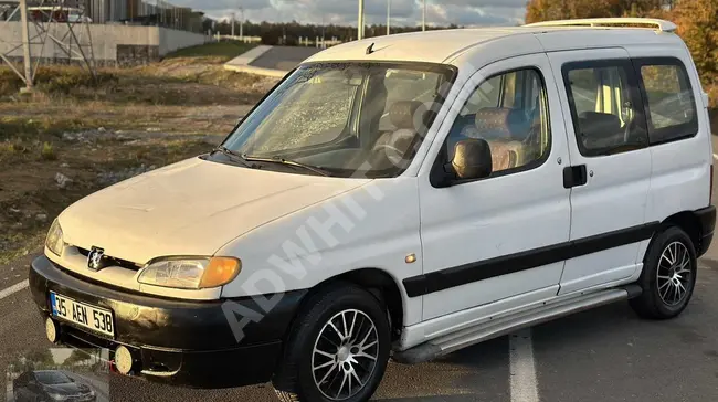 Peugeot 1.9 car, model 2002 with air conditioning. The car is in very clean condition from AYAZ MOTORS.