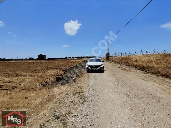 722 square meters of agricultural land on the road frontage allocated for exchange with a vehicle.