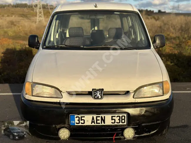 Peugeot 1.9 car, model 2002 with air conditioning. The car is in very clean condition from AYAZ MOTORS.