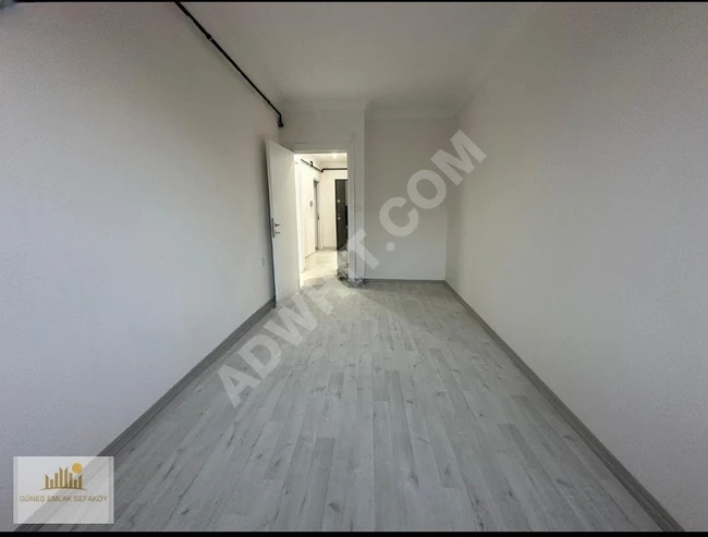 2+1 apartment with an area of 80m2, middle floor, with parking and elevator for sale in TEYFİKBEY