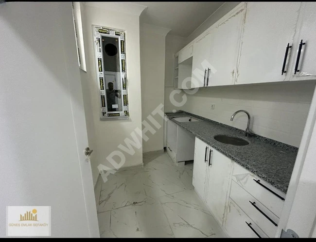 2+1 apartment with an area of 80m2, middle floor, with parking and elevator for sale in TEYFİKBEY