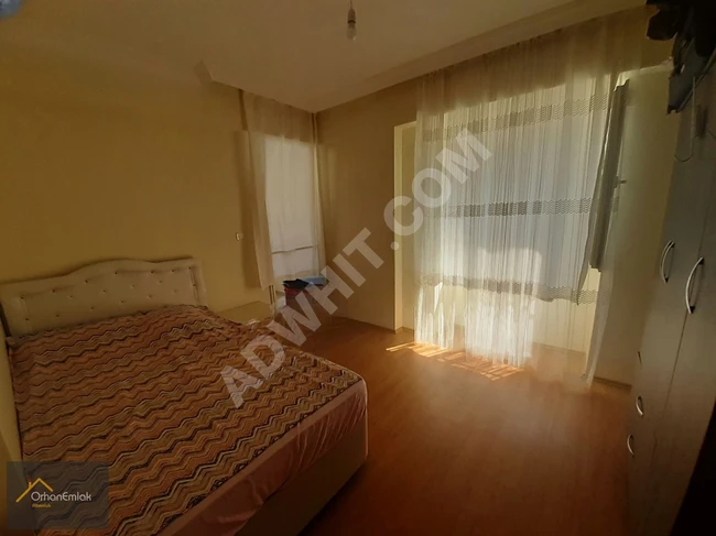 Apartment for sale in ALTINOLUK in a residential complex with a swimming pool, 3+1 - from Orhan Emlak