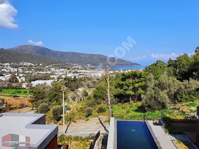 3+1 apartment for sale, extremely luxurious, with a full sea view in the BODRUM TORBA area