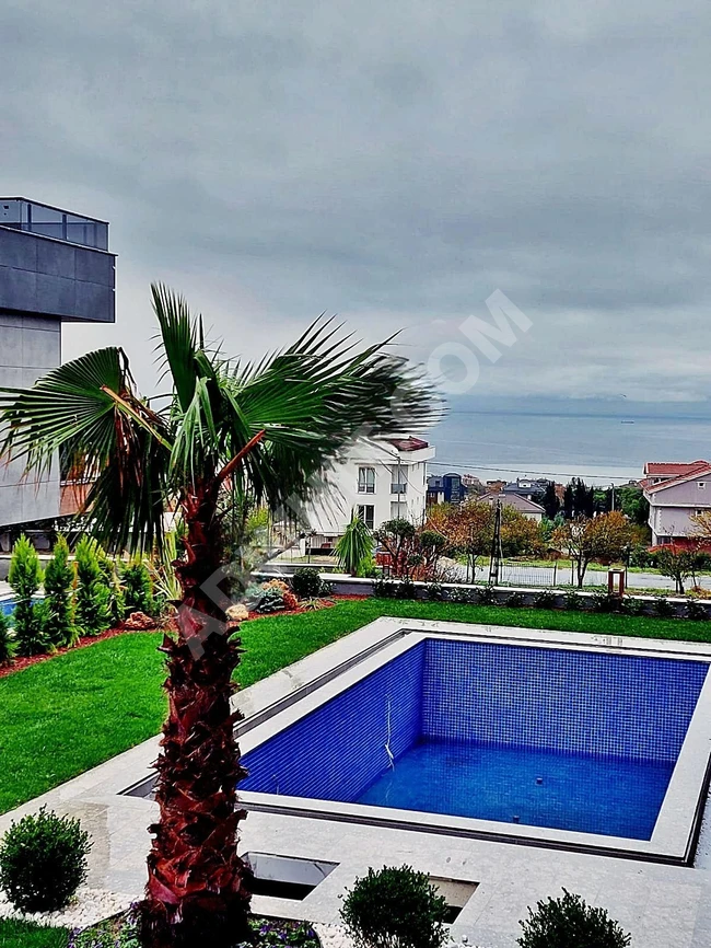 Independent villa for sale with a complete sea view and swimming pool in BEYLİKDÜZÜ DEREAGZI.