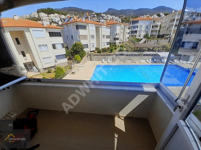 Apartment for sale in ALTINOLUK in a residential complex with a swimming pool, 3+1 - from Orhan Emlak