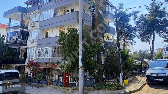 Apartment 2+1 for sale in Altınoluk, with three open fronts, spacious and comfortable - from Orhan Emlak.