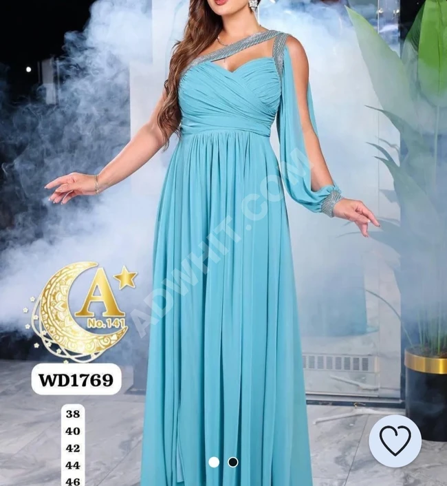 Evening chiffon dress with one sleeve