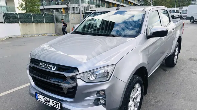 Isuzu 2023 - بعداد 33 الف , بغيار اوتوماتيكي , بمقصورة مزدوجة , بدون طلاء - من MOD