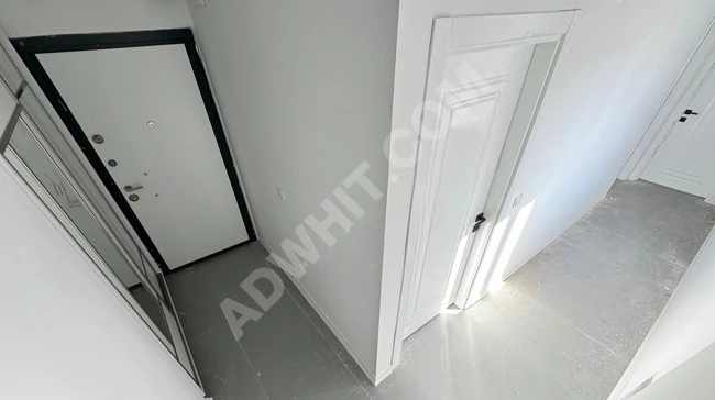 A new 2+1 apartment with a great underfloor heating system and an elevator in ÖREN - by GÜMÜŞ