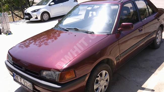 سيارة للبيع العاجل Mazda 323 موديل 94