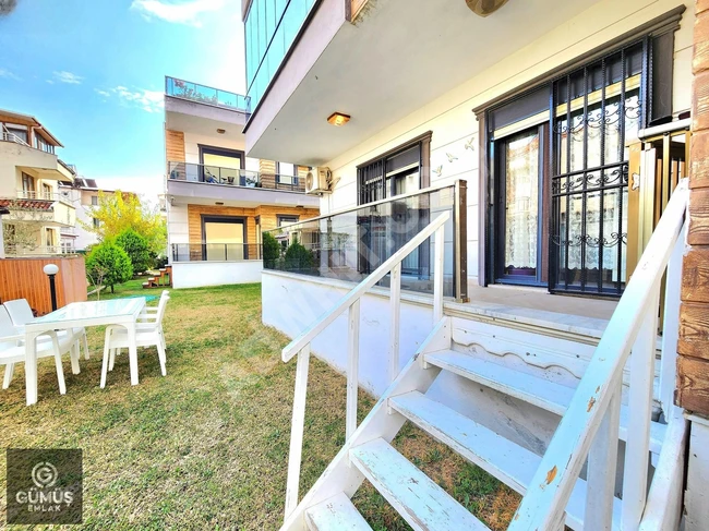 2+1 apartment with garden access, 100m from the sea, from the sole agent GÜMÜŞ.