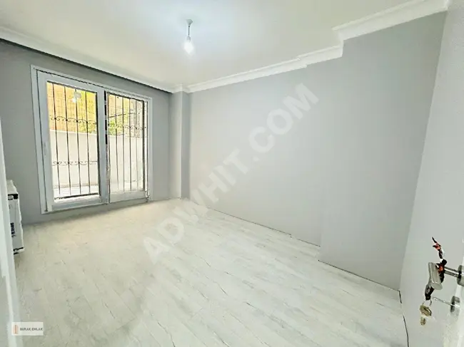 **BURAK **tan SATILIK  CADDE  ÜSTÜ  ASANSÖRLÜ  1+1.70m2. BAHÇELİ  BAHÇE  KATI