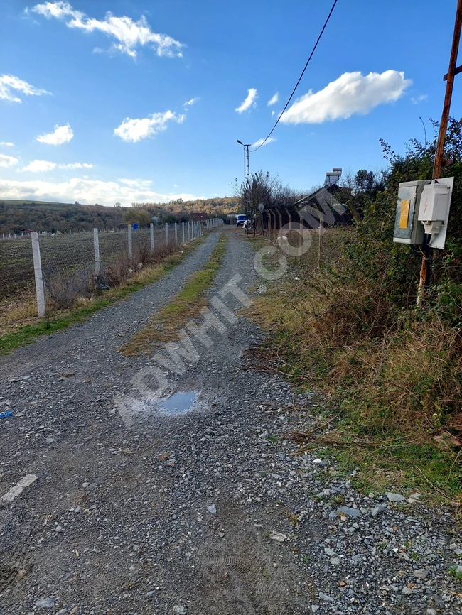 Land for sale with an area of 1 dunam in Baklalı Çınar Dere.