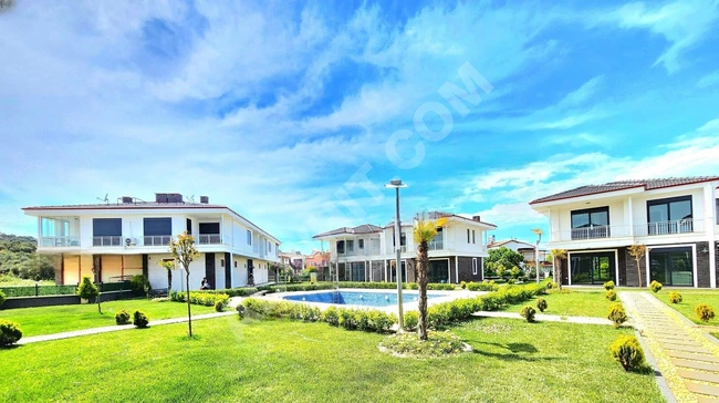 A luxurious 4+1 independent house with sea view in BURHANİYE - from GÜMÜŞ.