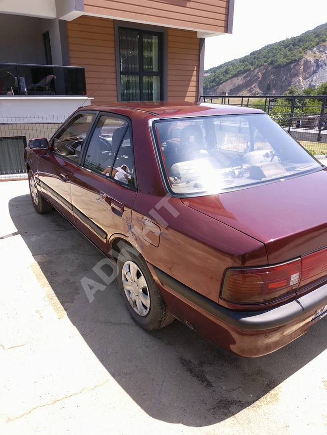 Car for urgent sale Mazda 323 model 94