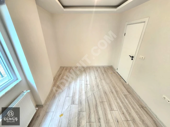 GÜMÜŞDEN AKÇAYDA MERKEZİ ISITMALI ÖN CEPHE LÜX TASARIM 1+1 DAİRE