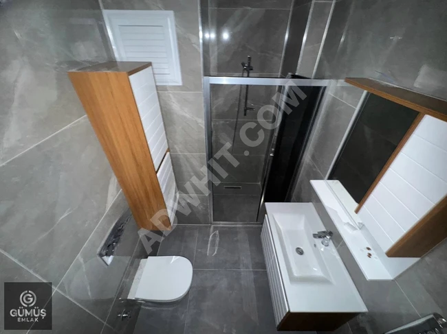 Amazing 2+1 apartment, with an en-suite bathroom, in a residential complex, located in ÖREN - by Gümüş Real Estate.