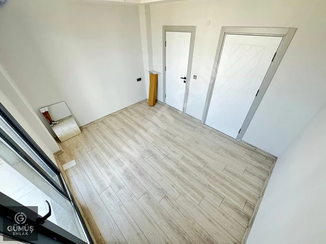 Amazing 2+1 apartment, with an en-suite bathroom, in a residential complex, located in ÖREN - by Gümüş Real Estate.