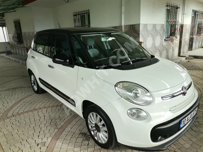 A fuel-efficient family car with a glass roof.