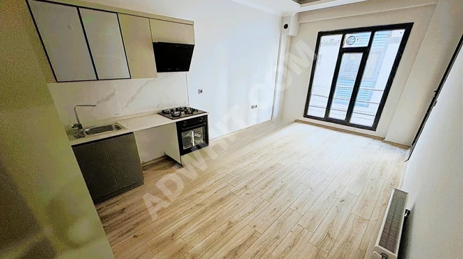 1+1 apartment for sale with natural gas heating located in AKÇAY neighborhood - from BİLGİ