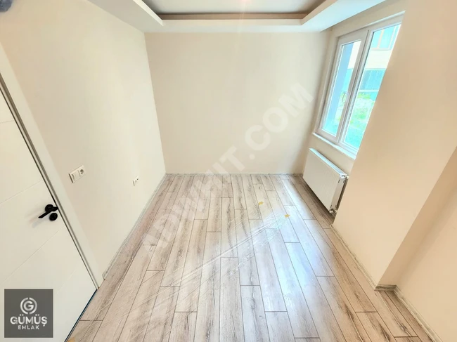 GÜMÜŞDEN AKÇAYDA MERKEZİ ISITMALI ÖN CEPHE LÜX TASARIM 1+1 DAİRE