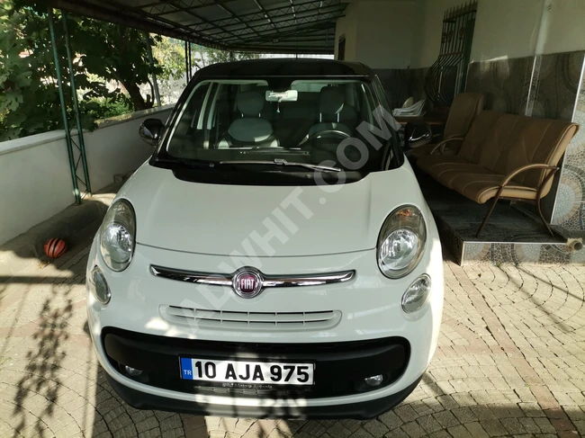 A fuel-efficient family car with a glass roof.