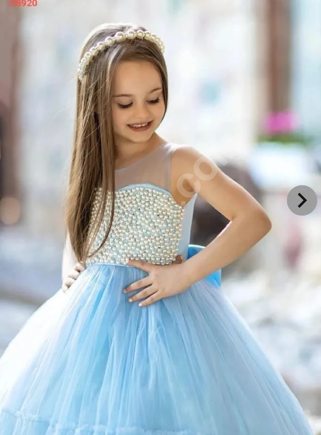 Girls' tulle dress adorned with pearls