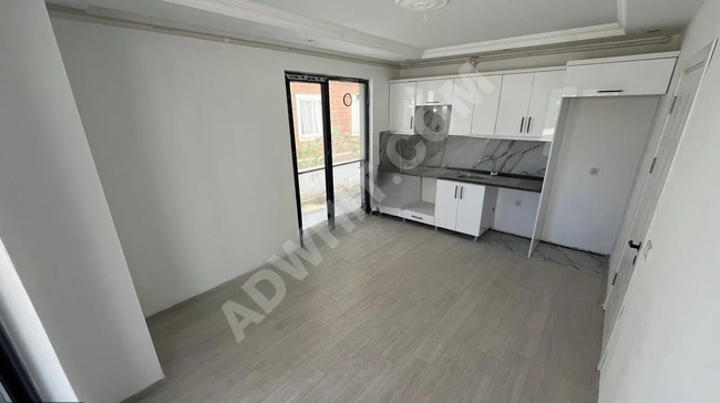 GÜMÜŞDEN BAHÇELİEVLERDE YERDEN ISITMALI ASANSÖRLÜ SIFIR 2+1DAİRE