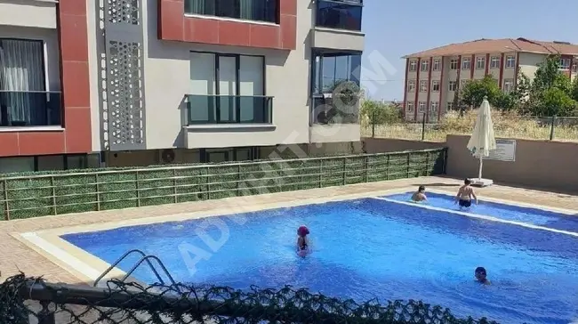 3+1 apartment for sale in a residential complex with a swimming pool in the center of Beylikdüzü Kavaklı